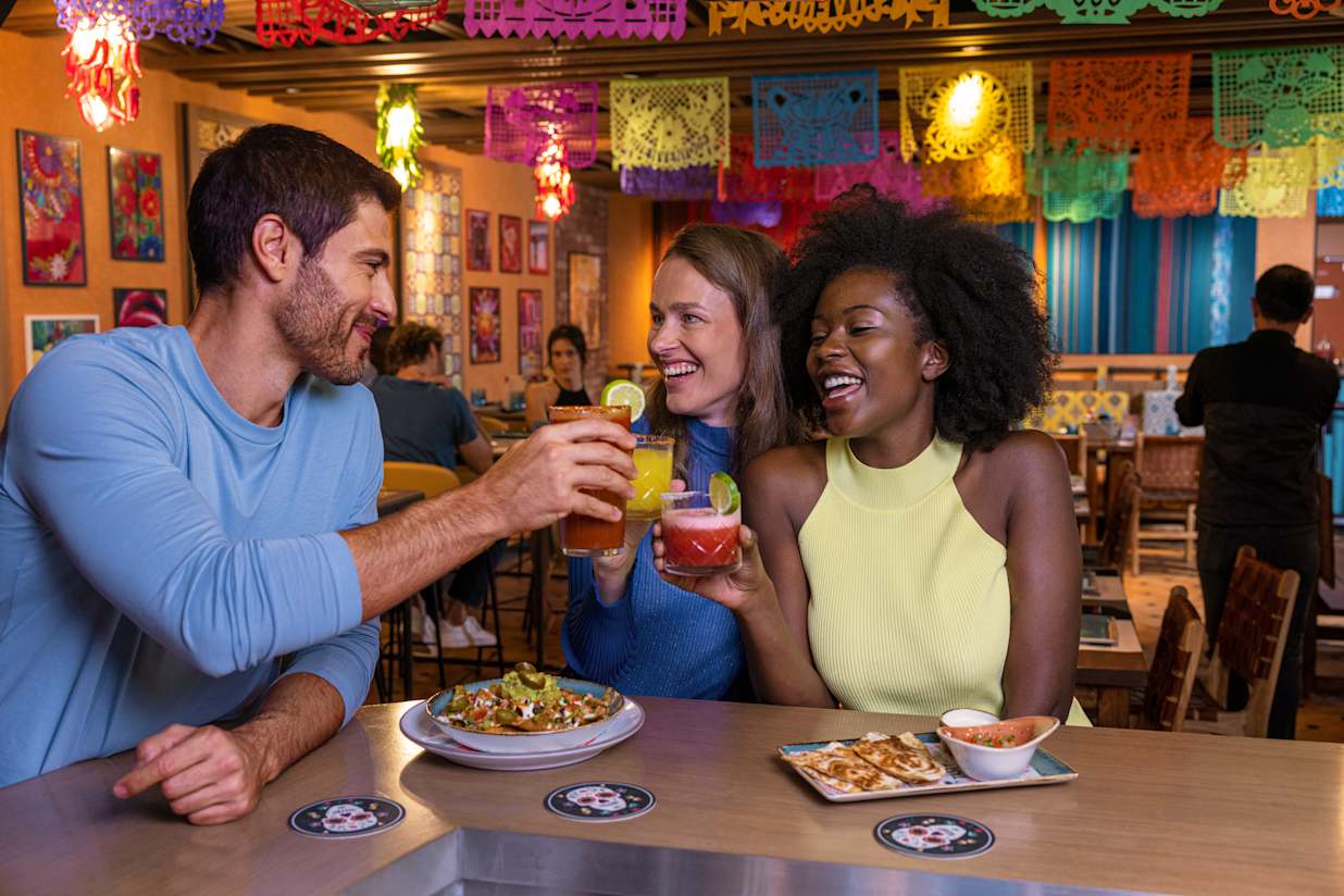 Friends enjoying drinks on a MSC Cruise ship